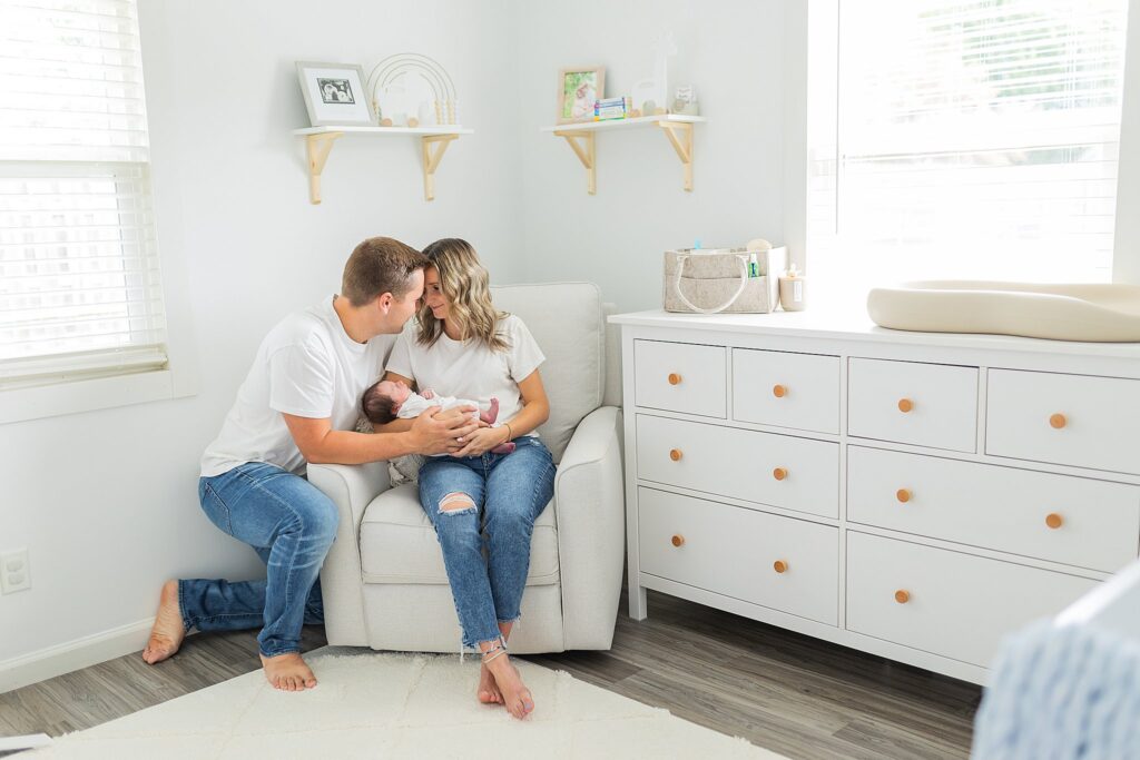 Lifestyle Newborn session with mom, dad, and baby